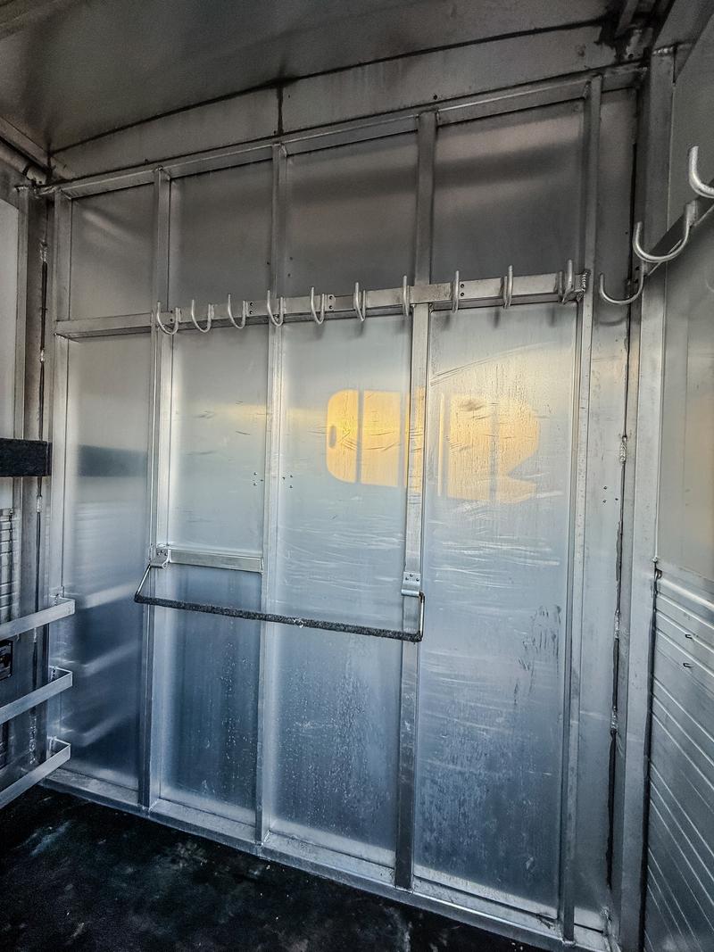 Bridle hooks and blanket bar inside dressing room