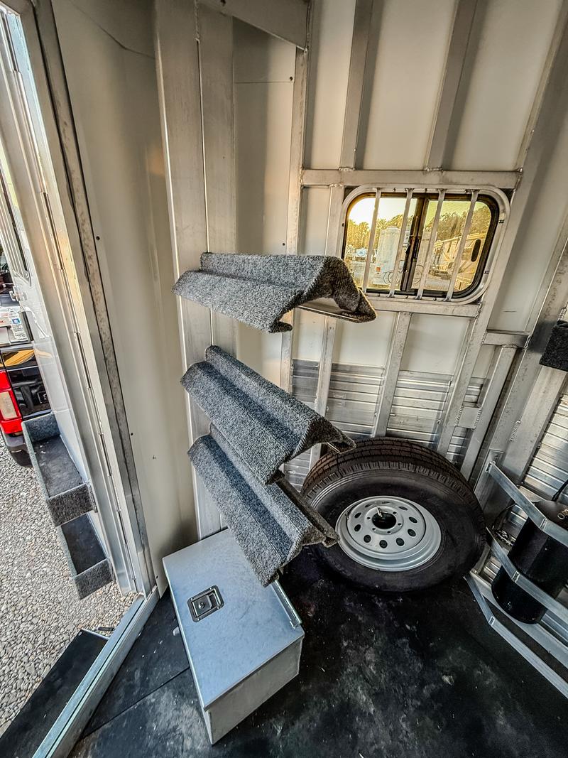 Spare tire and saddle rack in tack room