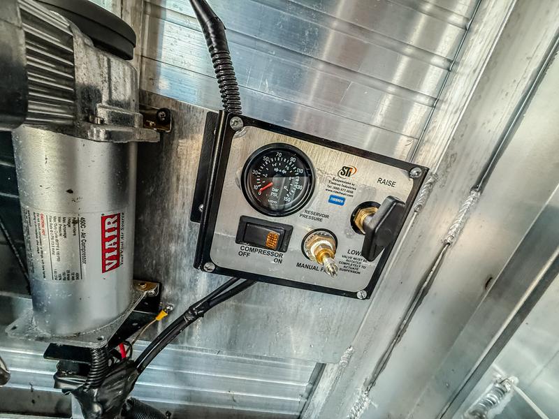 Air Ride Control panel behind tack wall access